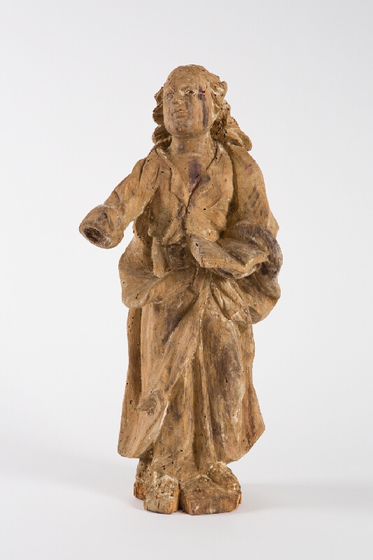 Slovenský ľudový rezbár z 1. polovice 19. storočia – Svätec s knihou 