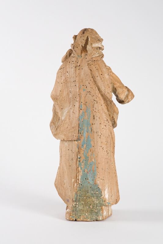 Slovenský ľudový rezbár z 1. polovice 19. storočia – Svätec s knihou 