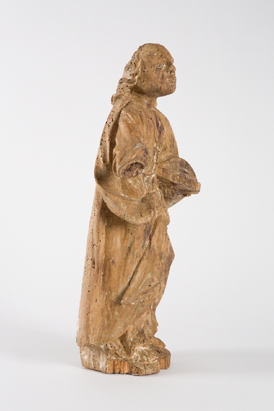 Slovenský ľudový rezbár z 1. polovice 19. storočia – Svätec s knihou 